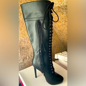 Black lace up high heel boot
